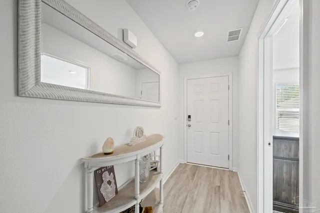 a view of livingroom with furniture and wooden floor