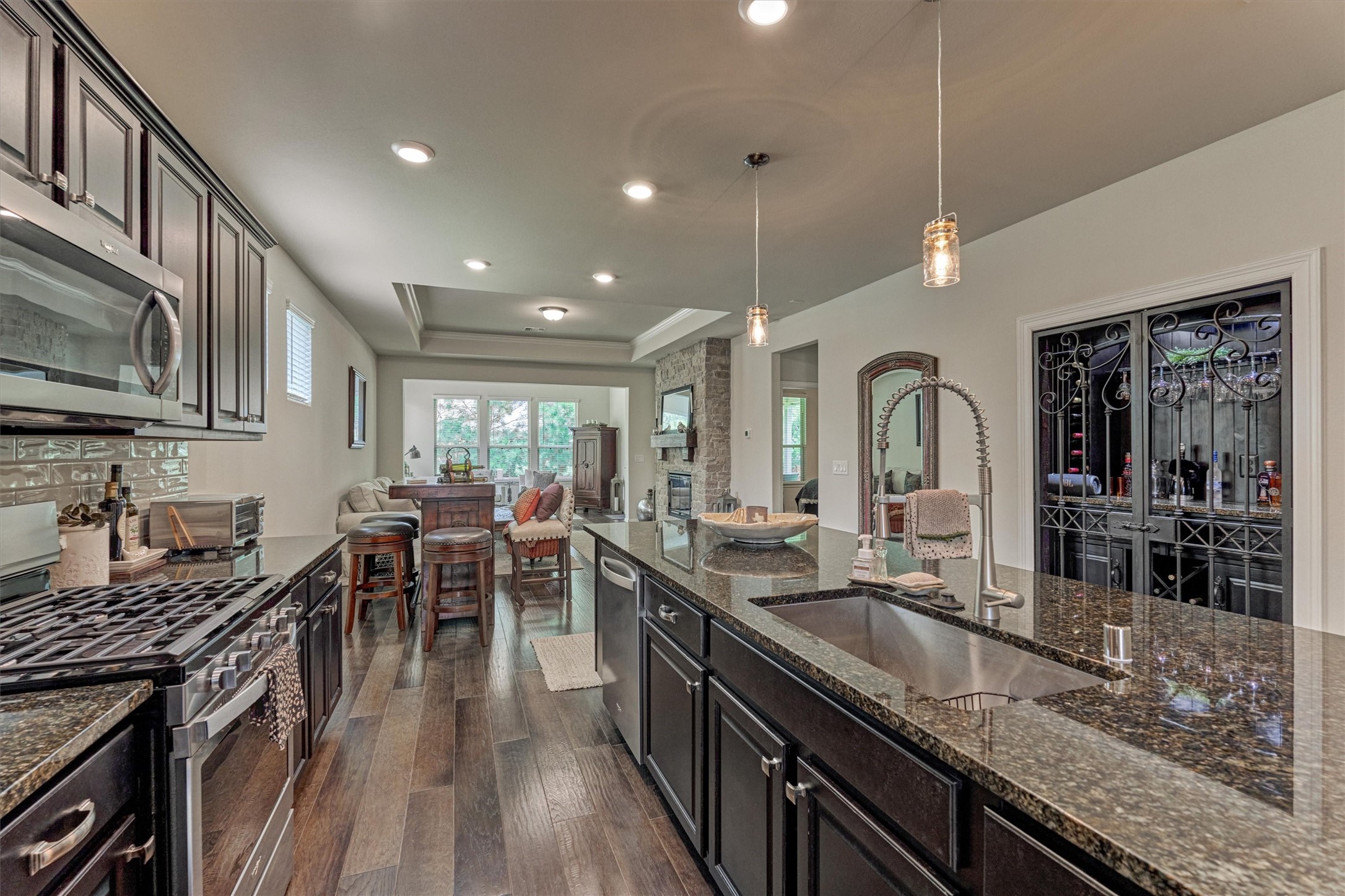 128 Caspian Way Spring Spring, TX 77382 - Photo 13 of 48 a kitchen with lots of counter and chairs