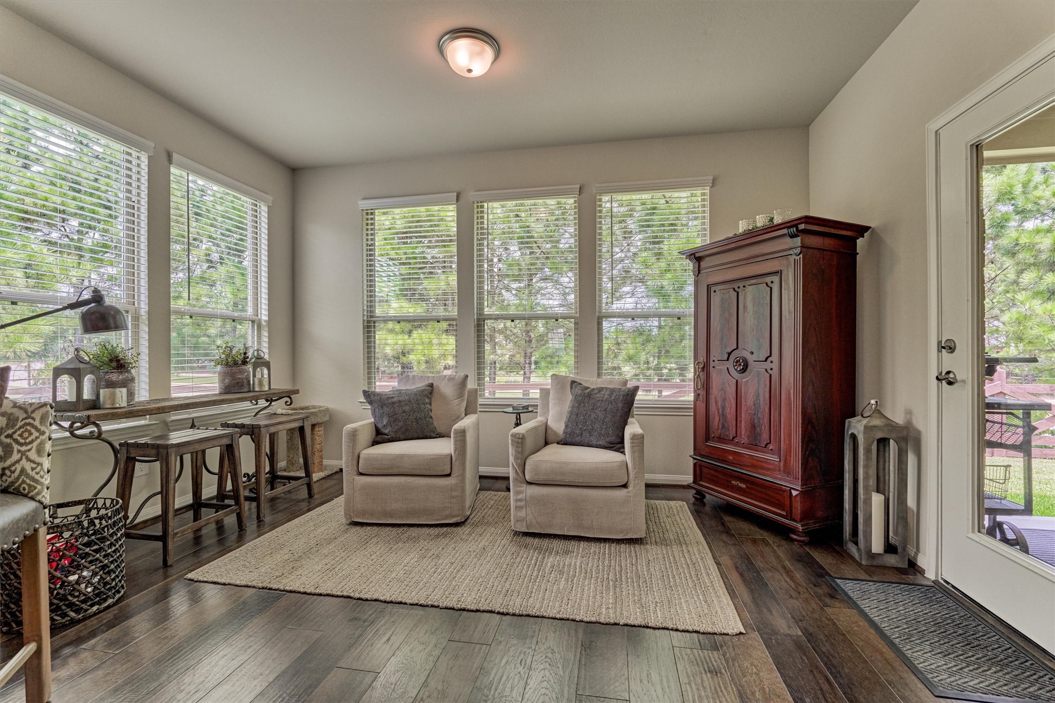 128 Caspian Way Spring Spring, TX 77382 - Photo 18 of 48 a living room with furniture and large windows