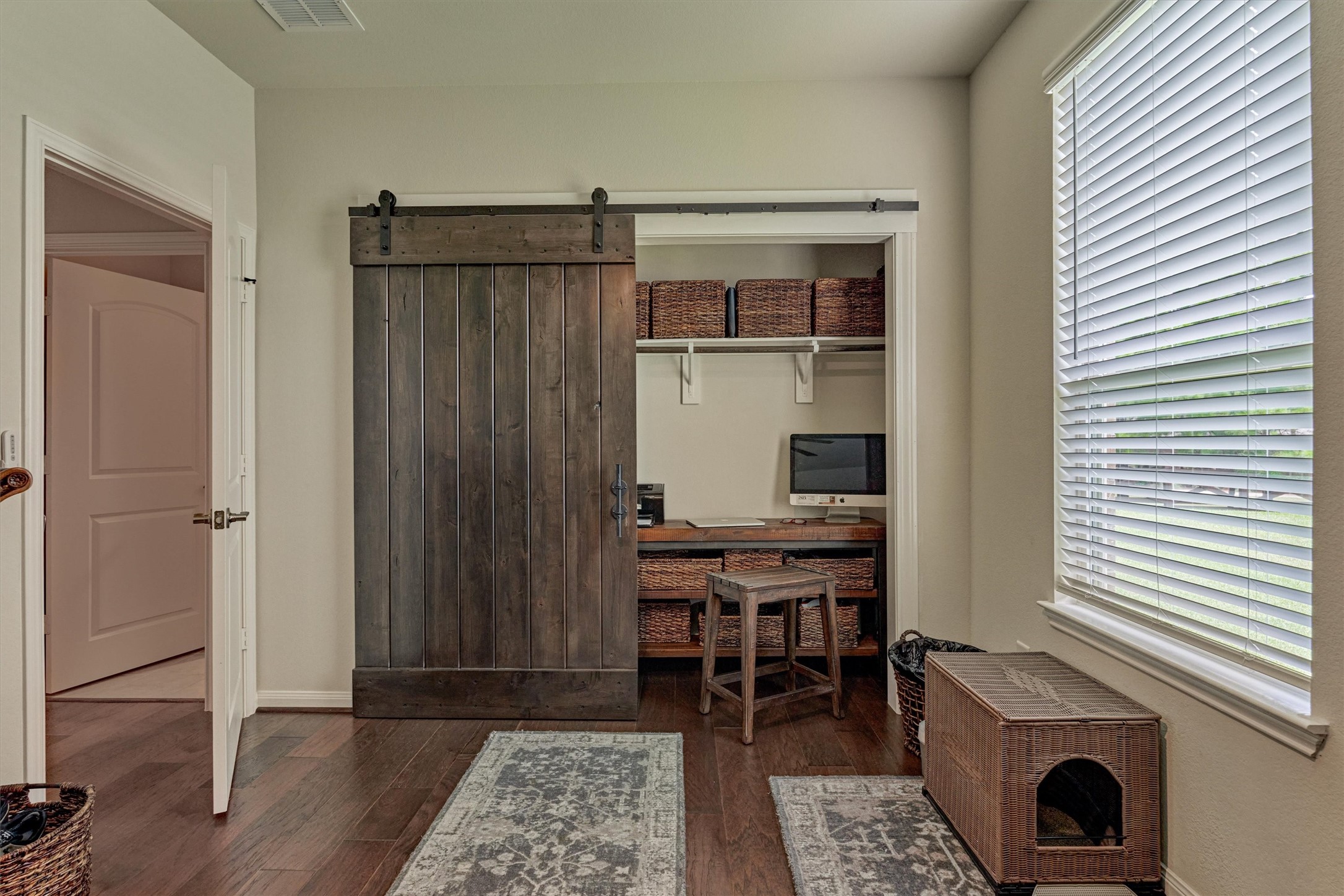 128 Caspian Way Spring Spring, TX 77382 - Photo 26 of 48 a workspace with wooden floor and a window