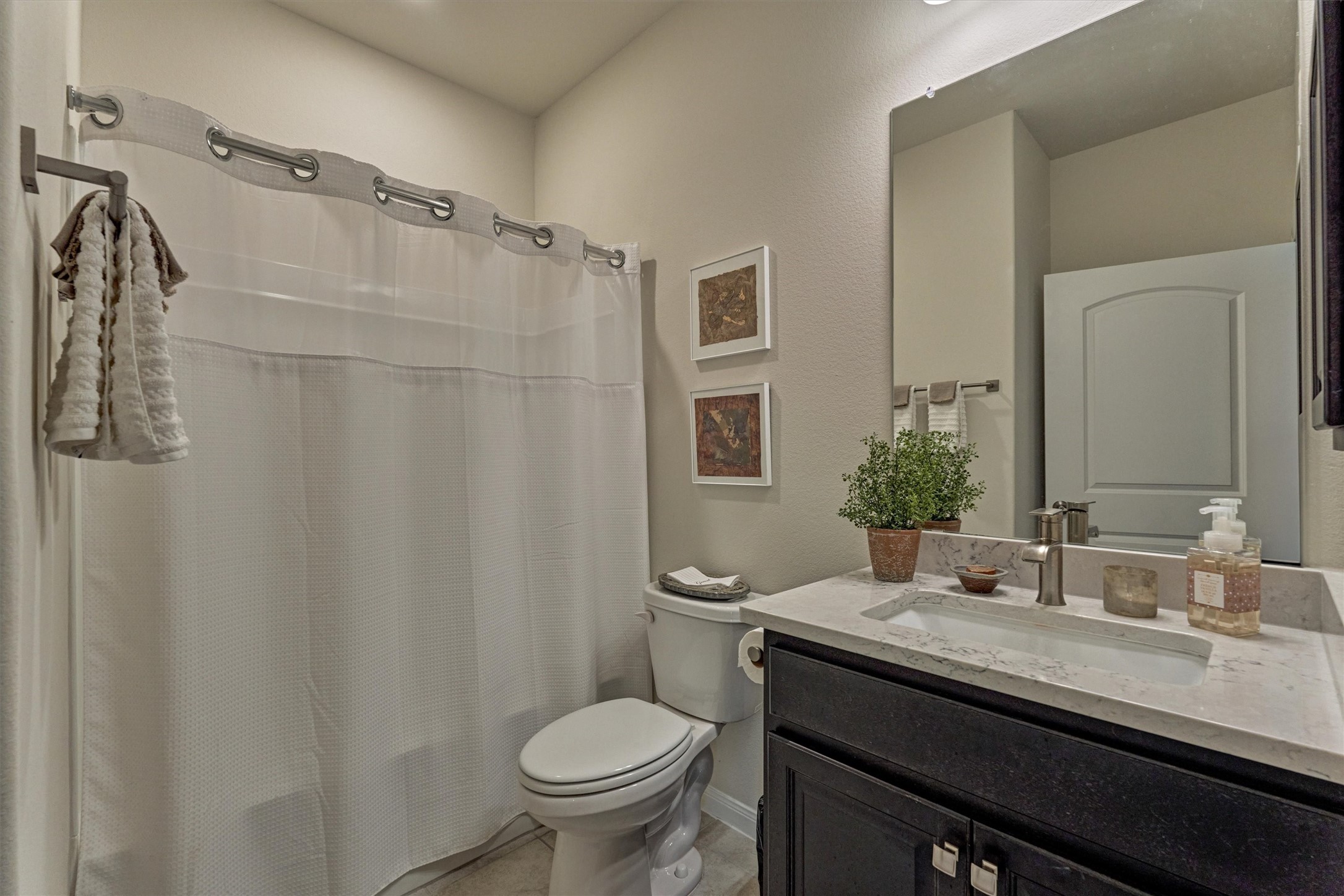 128 Caspian Way Spring Spring, TX 77382 - Photo 27 of 48 a bathroom with a granite countertop sink toilet and shower
