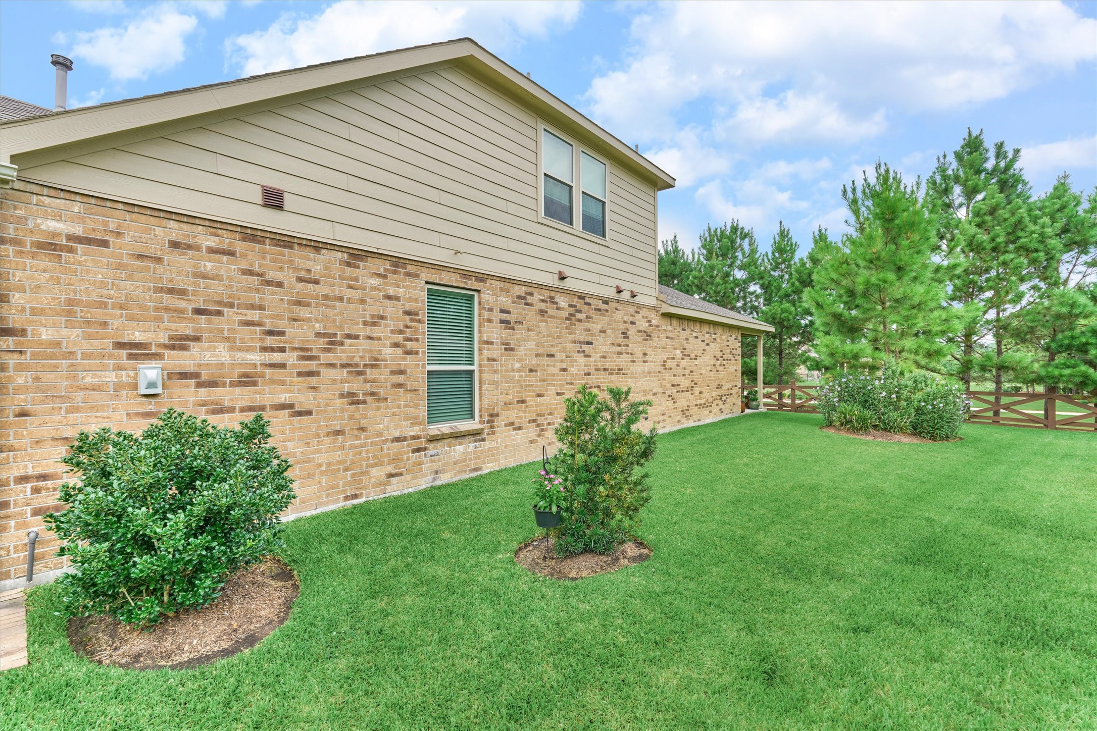 128 Caspian Way Spring Spring, TX 77382 - Photo 35 of 48 a front view of a house with garden