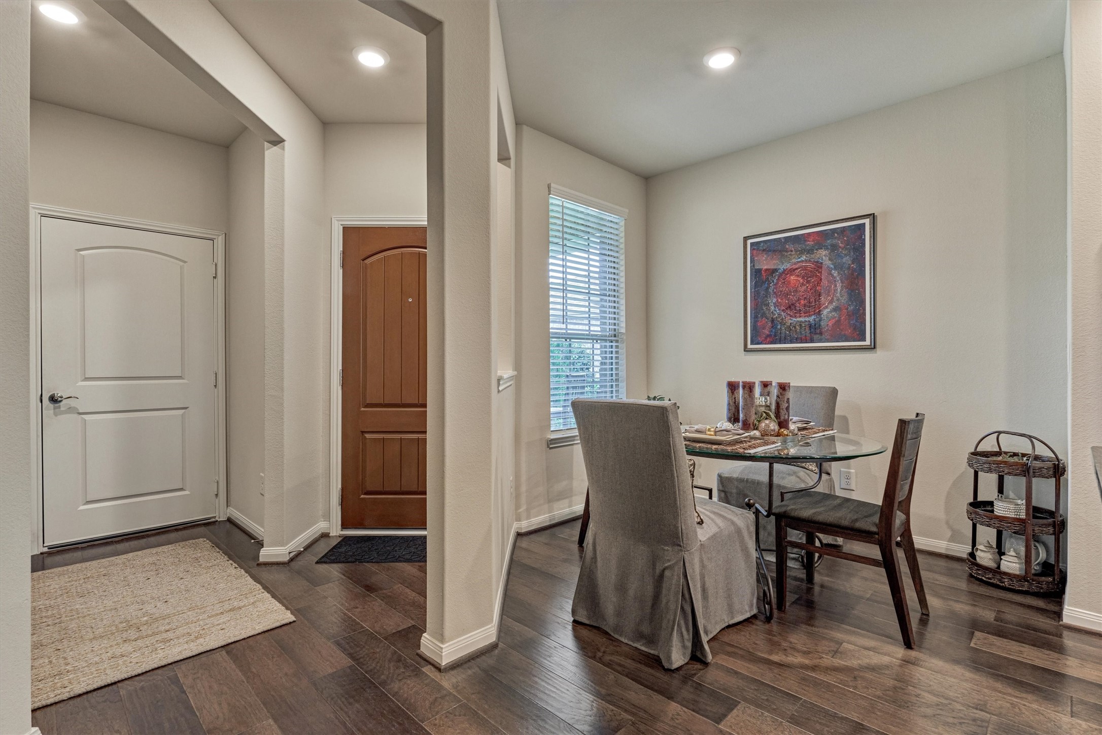 128 Caspian Way Spring Spring, TX 77382 - Photo 5 of 48 a view of a dining room with furniture and wooden floor