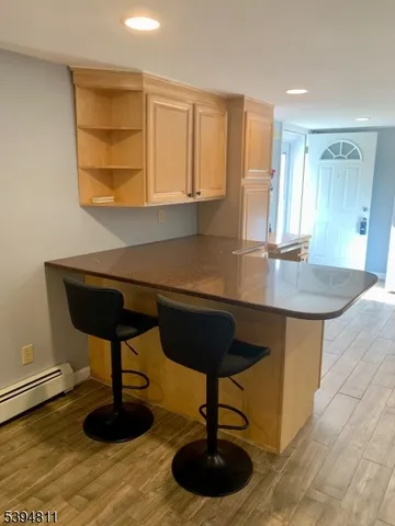 a bathroom with a shower and a toilet