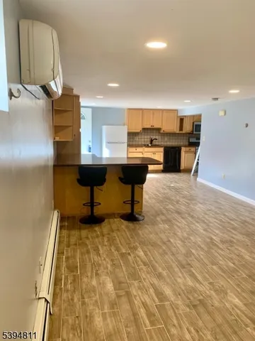 a kitchen with a counter space and a table