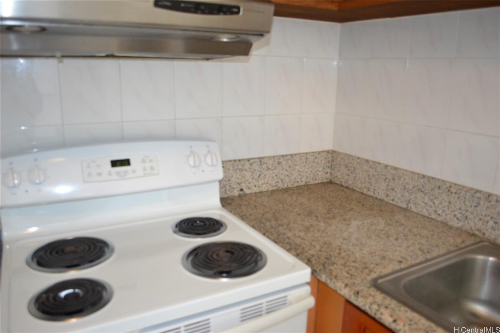 814 Kinau Street, Unit 202 Honolulu, HI 96813 - Photo 5 of 14 a close view of sink and cabinets