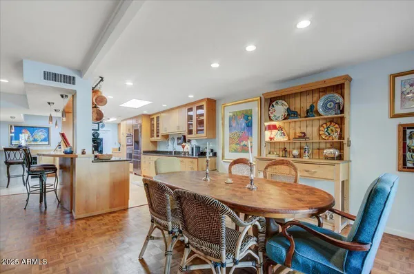 a kitchen with stainless steel appliances granite countertop a sink and cabinets