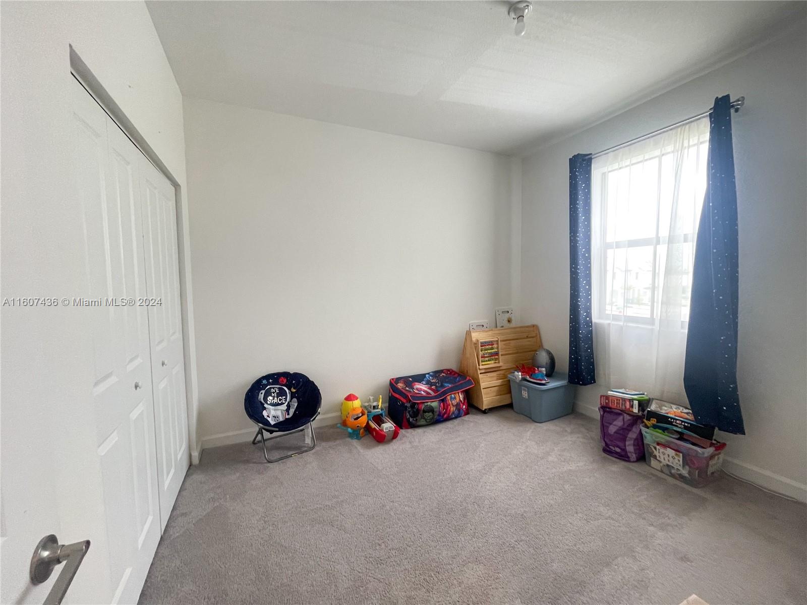 13414 Southwest 286th Street, Unit 13414 Homestead, FL 33033 - Photo 31 of 34 a view of a room with toys