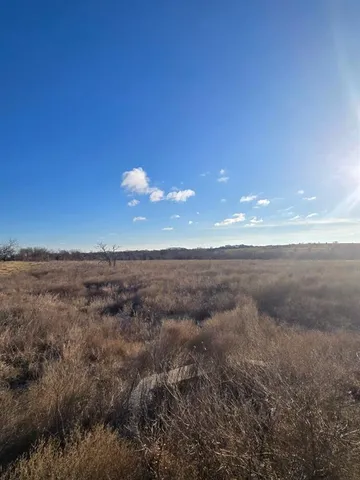 a view of an outdoor space and a yard