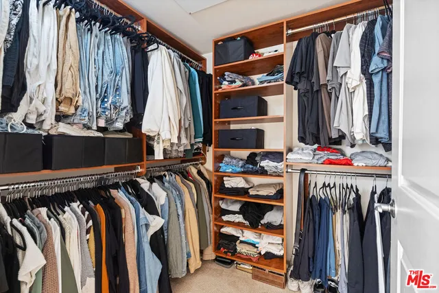 a view of a hallway with washer and dryer