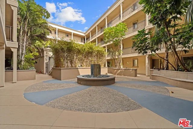 a front view of a building with yard