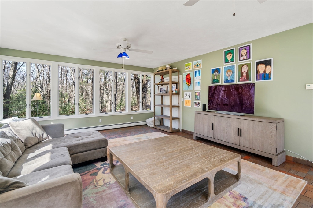 3 Goose Pond Road Lincoln, MA 01773 - Photo 20 of 37 a living room with furniture and a flat screen tv