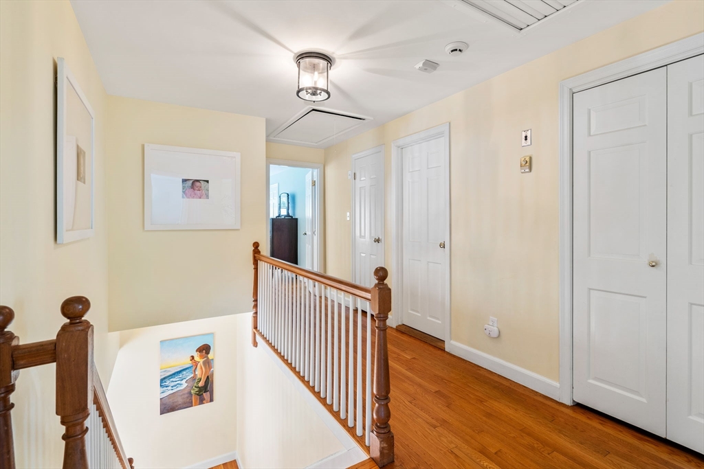 3 Goose Pond Road Lincoln, MA 01773 - Photo 24 of 37 a view of a hallway with wooden floor and staircase