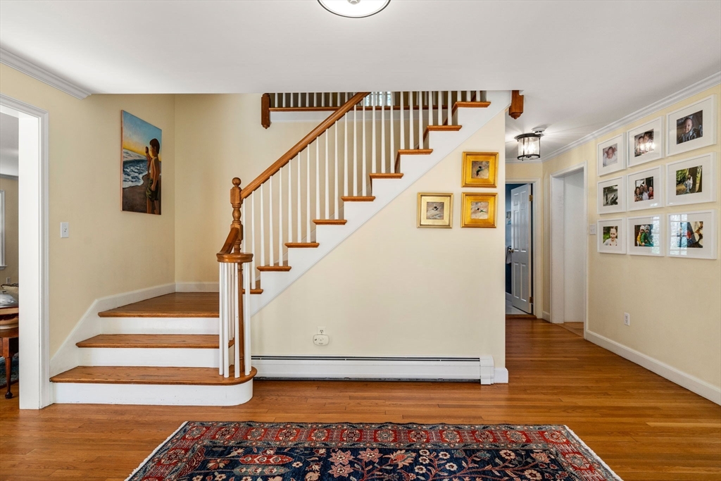 3 Goose Pond Road Lincoln, MA 01773 - Photo 3 of 37 a view of entryway and hall with wooden floor
