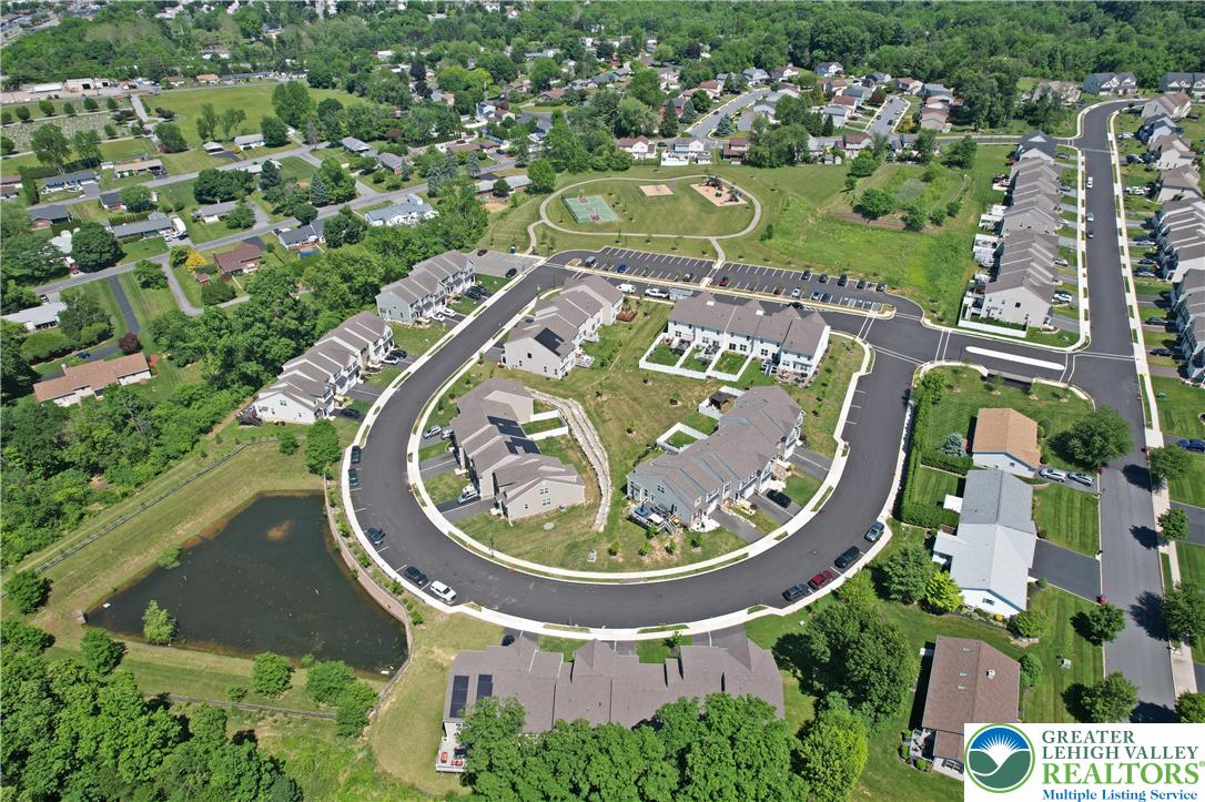 4502 Benjamin Court Emmaus, PA 18049 - Photo 49 of 53 An aerial perspective reveals a vibrant community with townhomes.