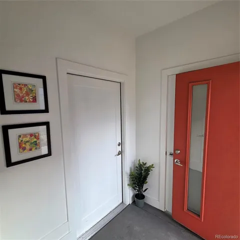 an entryway with a hallway