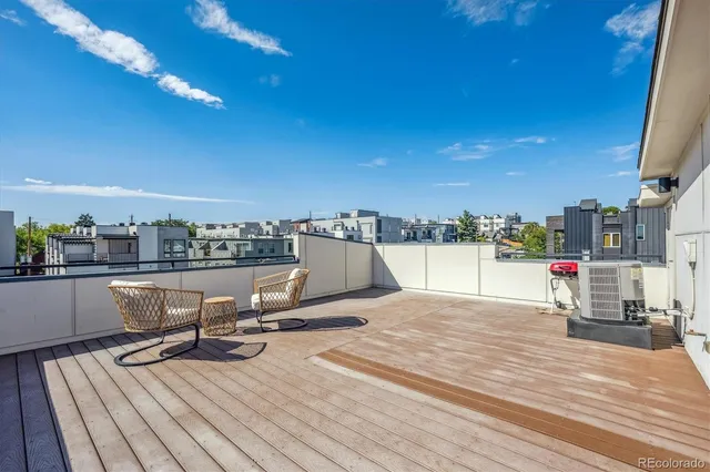 a view of a terrace with seating area