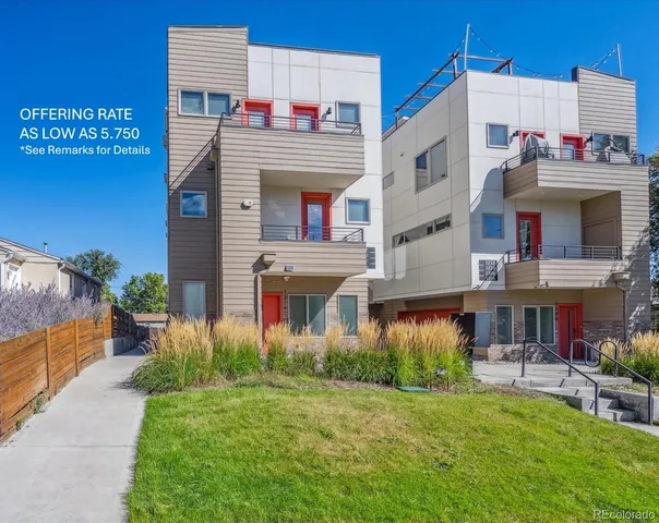 a view of a building with a yard