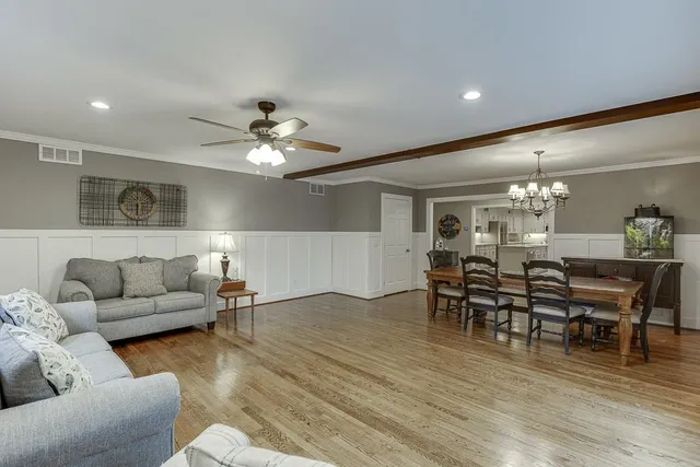 a kitchen with sink and cabinets