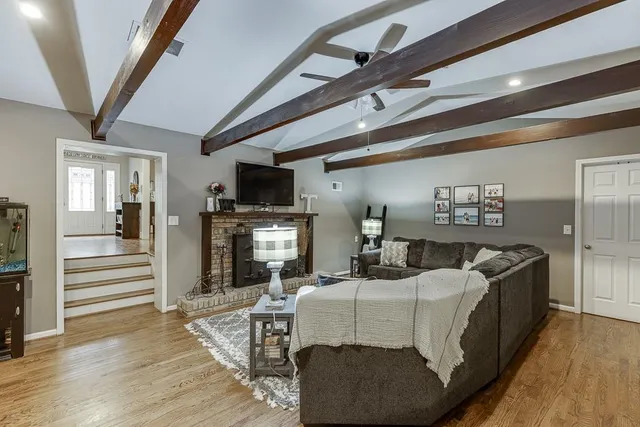 a living room with furniture and a couch