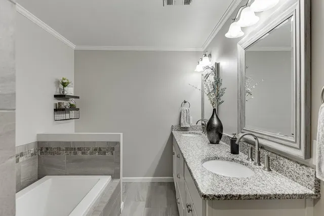 a view of a house with backyard porch and wooden
