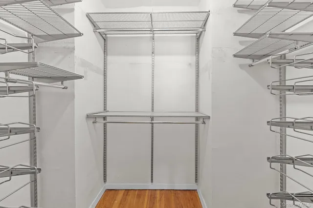 a view of a room with racks on the wall