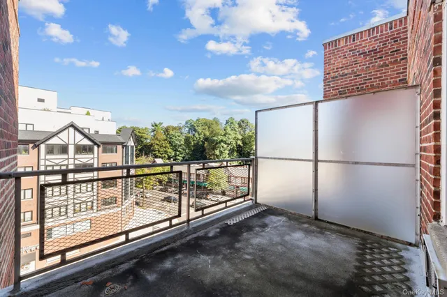a view of a balcony with city view