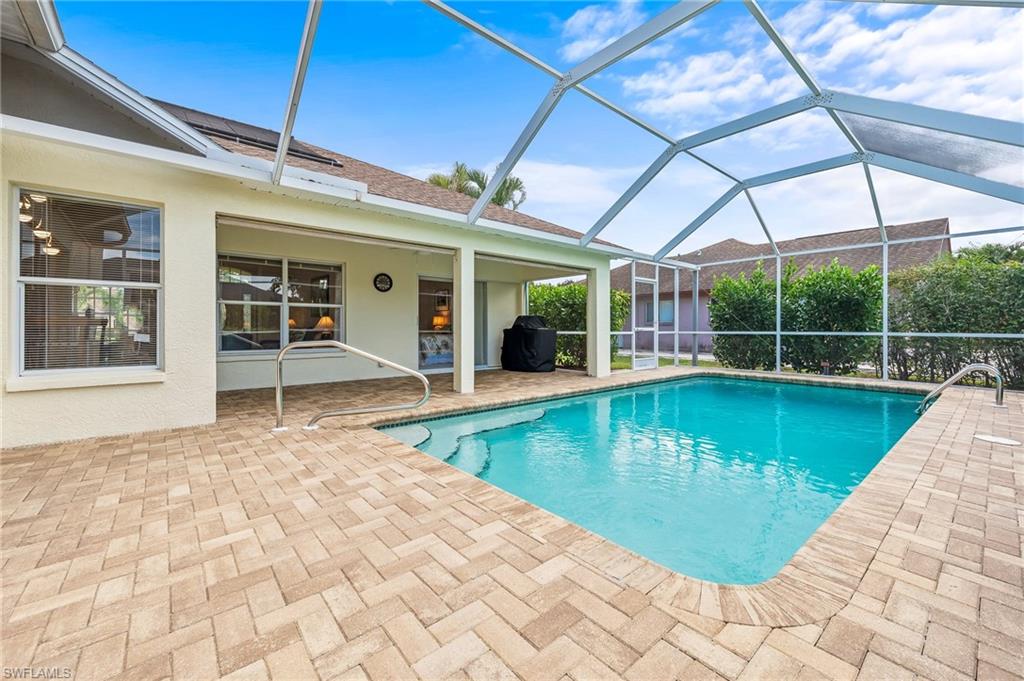 511 Ibis Way Naples, FL 34110 - Photo 34 of 46 a view of a house with swimming pool