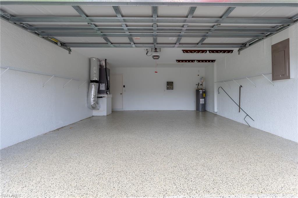 511 Ibis Way Naples, FL 34110 - Photo 38 of 46 a view of a garage