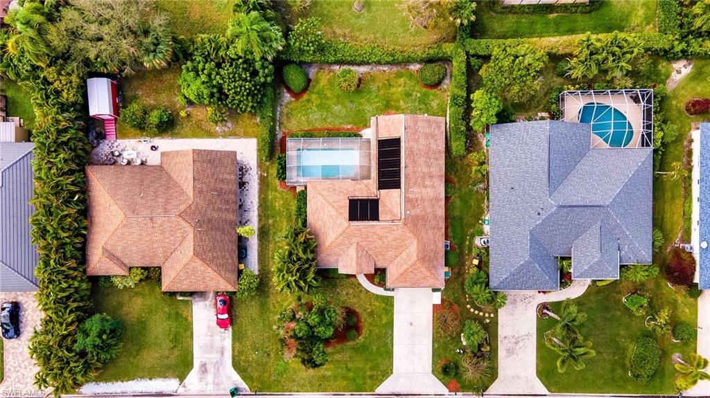 511 Ibis Way Naples, FL 34110 - Photo 40 of 46 an aerial view of residential houses with outdoor space