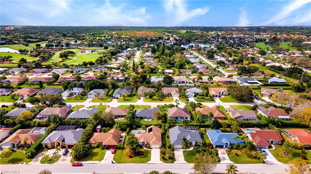 511 Ibis Way Naples, FL 34110 - Photo 42 of 46 an aerial view of multiple house