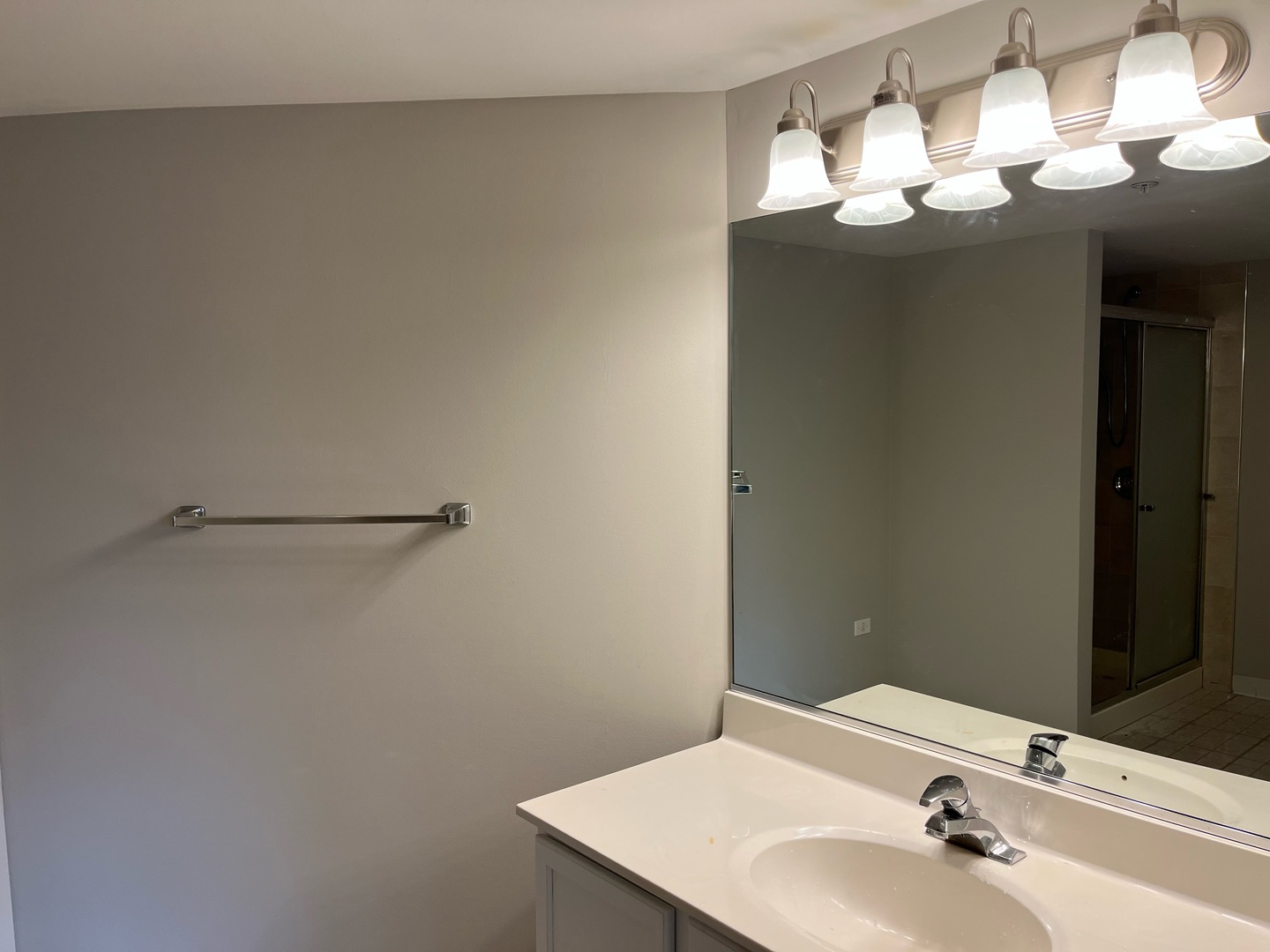 237 North Mill Road, Unit 2 Addison, IL 60101 - Photo 24 of 39 a bathroom with a sink and a mirror