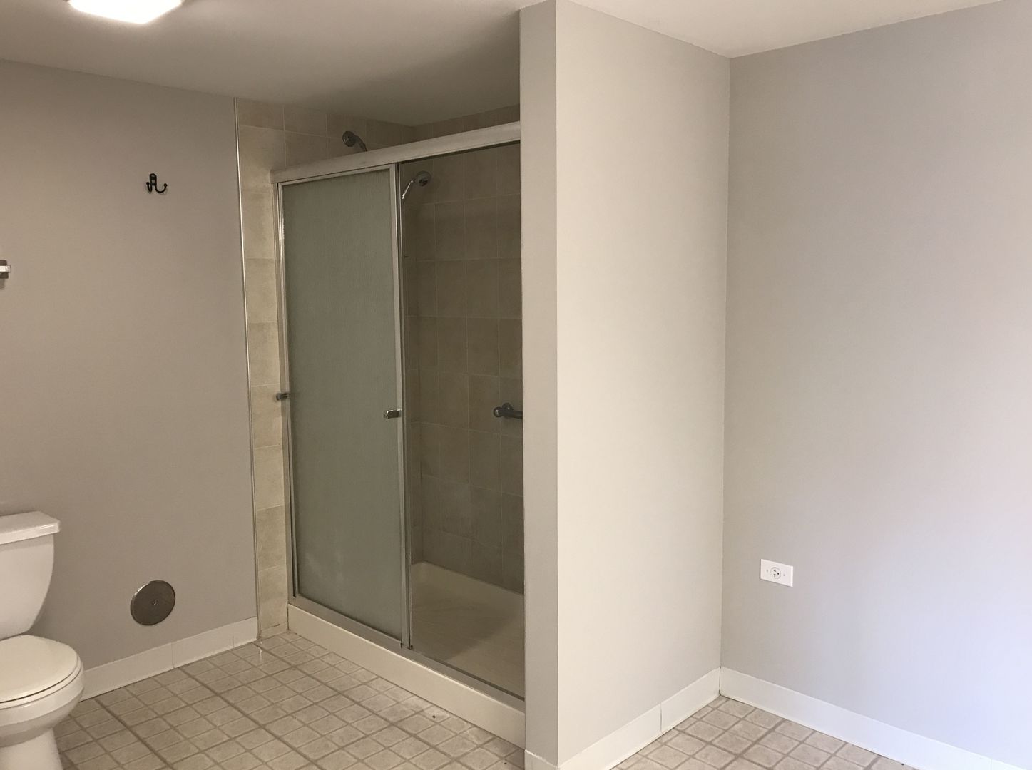 237 North Mill Road, Unit 2 Addison, IL 60101 - Photo 26 of 39 a bathroom with a shower and a toilet