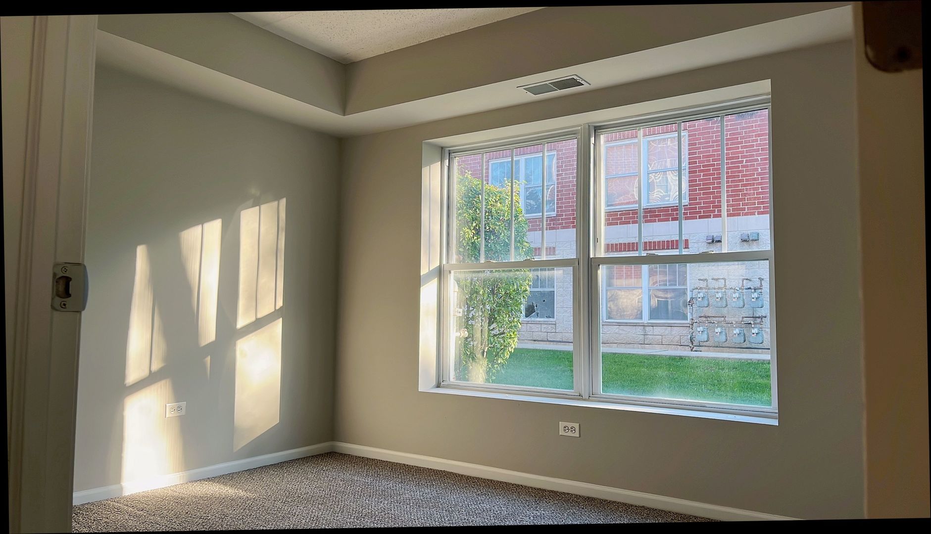 237 North Mill Road, Unit 2 Addison, IL 60101 - Photo 27 of 39 a view of an empty room with a window