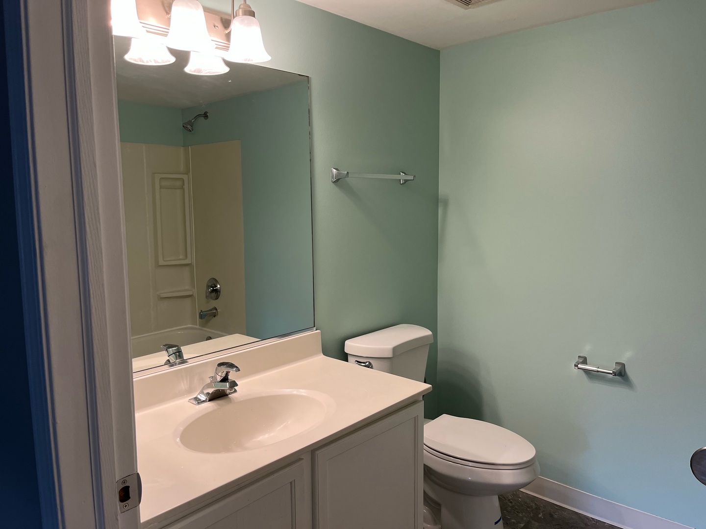 237 North Mill Road, Unit 2 Addison, IL 60101 - Photo 33 of 39 a bathroom with a sink toilet and mirror
