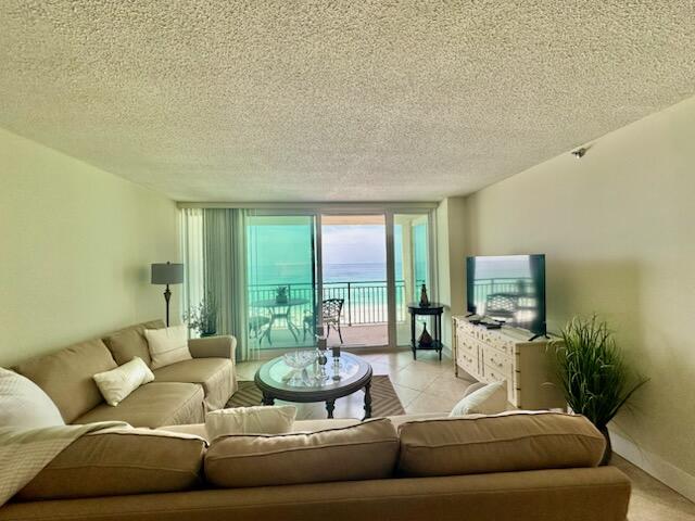 381 Santa Rosa Boulevard, Unit 709 Fort Walton Beach, FL 32548 - Photo 18 of 20 a living room with furniture and a large window