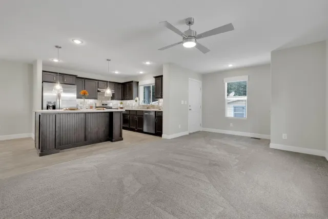 a view of kitchen with cabinets and stainless steel appliances