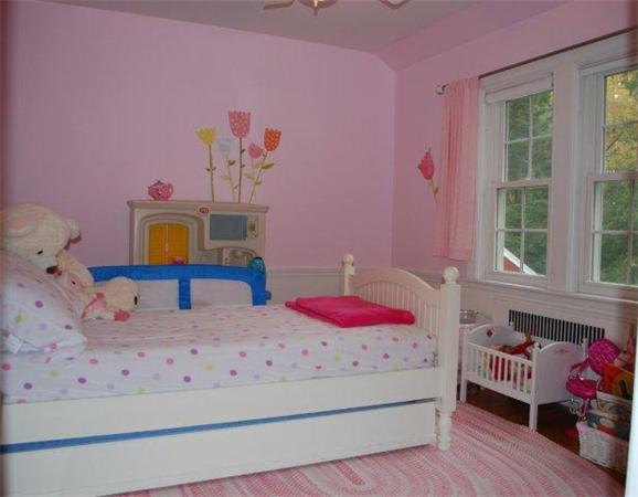 8 Thornton Road Waltham, MA 02453 - Photo 13 of 17 a bedroom with furniture and a window