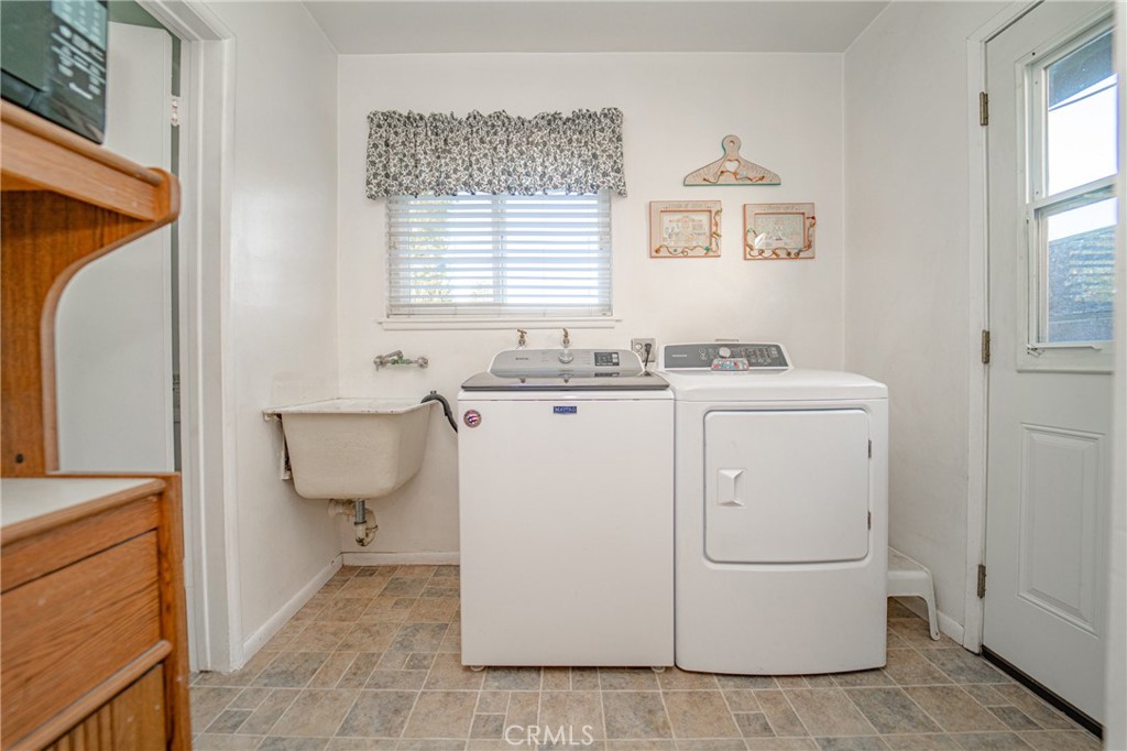 15212 Elmbrook Drive La Mirada, CA 90638 - Photo 19 of 51 a utility room with dryer and washer