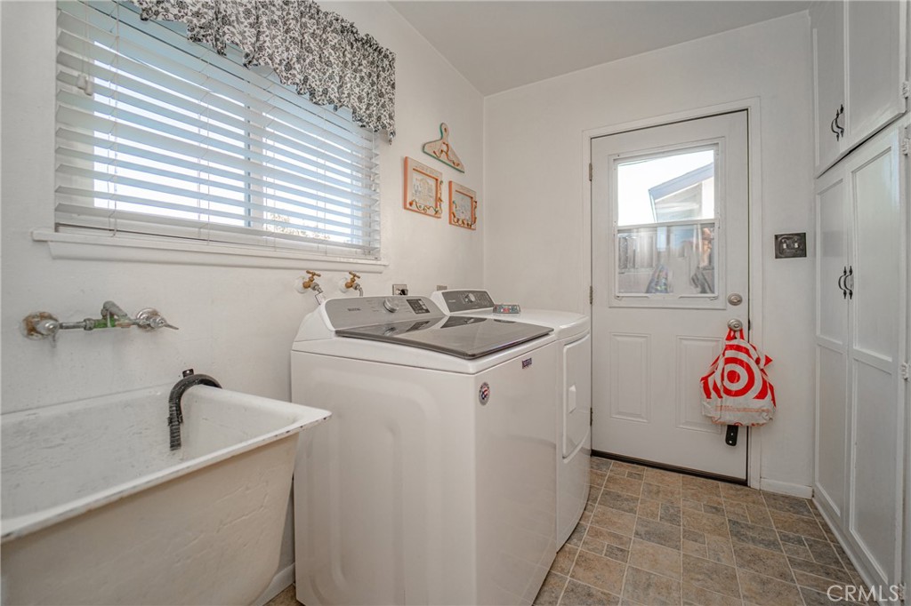 15212 Elmbrook Drive La Mirada, CA 90638 - Photo 20 of 51 a bathroom with a sink and a window