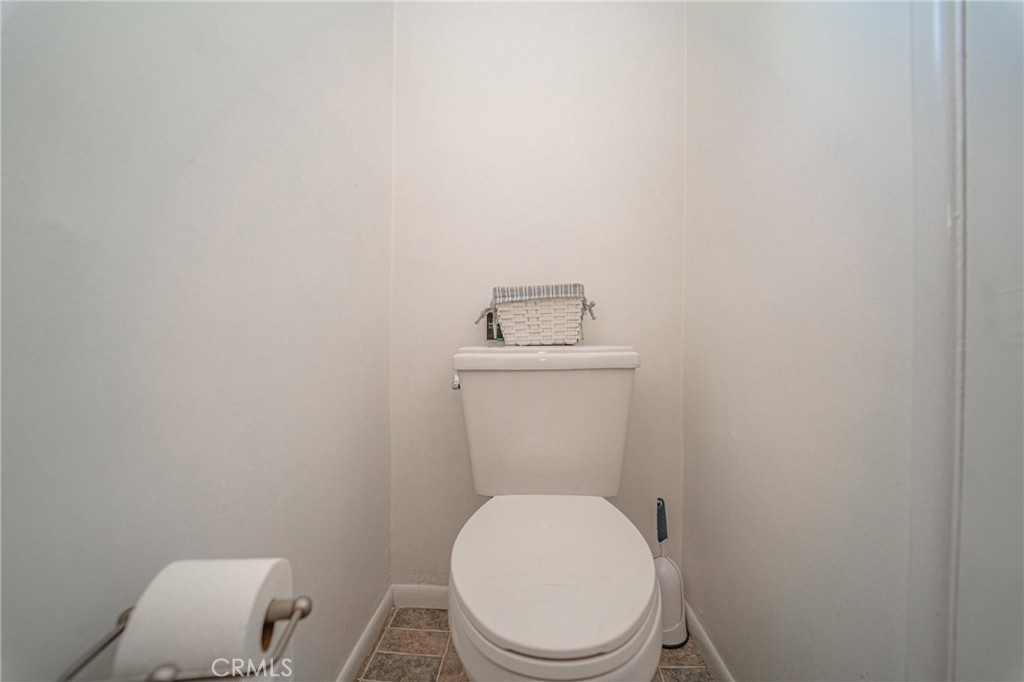 15212 Elmbrook Drive La Mirada, CA 90638 - Photo 21 of 51 a white toilet sitting next to a white sink