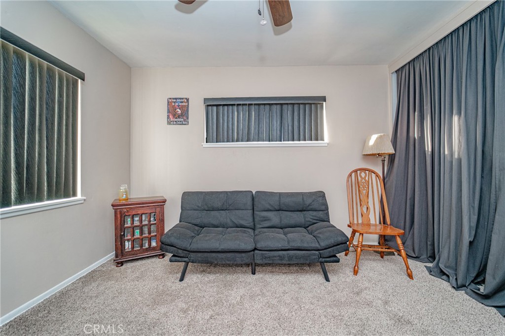 15212 Elmbrook Drive La Mirada, CA 90638 - Photo 26 of 51 a living room with furniture and a window
