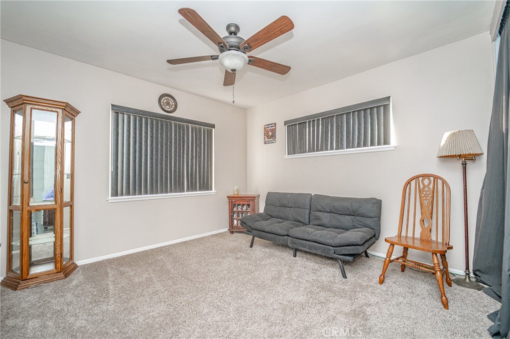 15212 Elmbrook Drive La Mirada, CA 90638 - Photo 27 of 51 a living room with furniture and a window