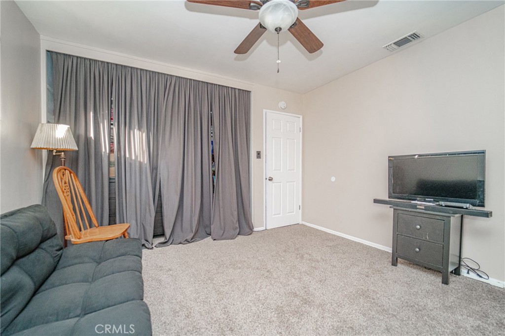 15212 Elmbrook Drive La Mirada, CA 90638 - Photo 28 of 51 a bedroom with furniture and a flat screen tv