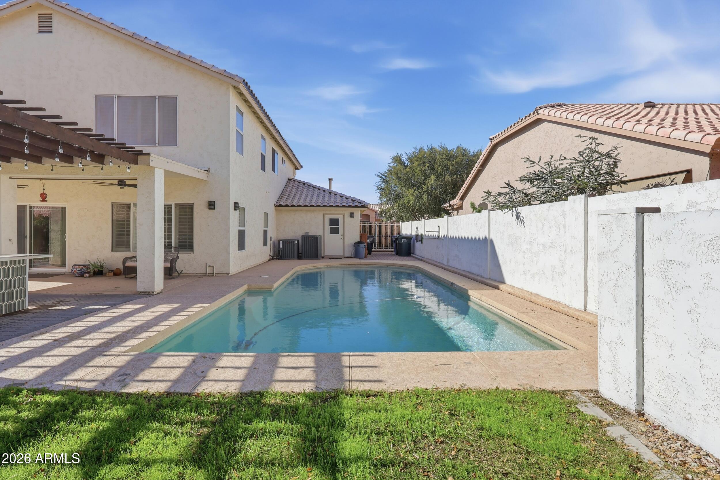 14025 South 44th Street Phoenix, AZ 85044 - Photo 34 of 52 a view of swimming pool with a yard