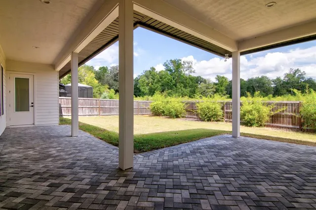 a view of porch with a backyard