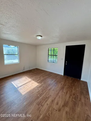 an empty room with windows