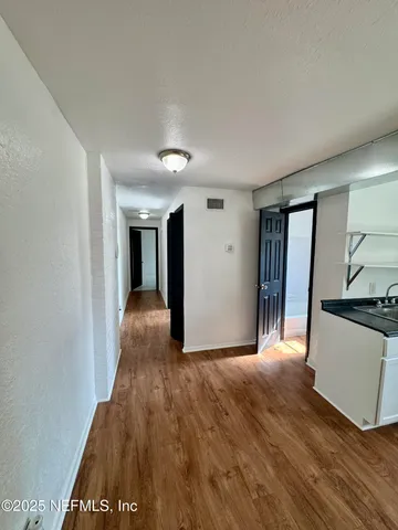 a view of a livingroom with a staircase