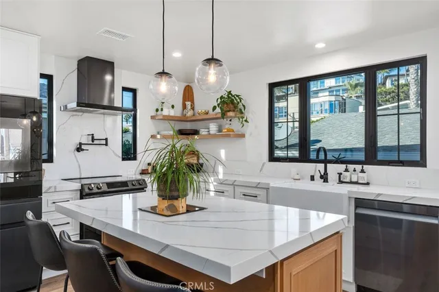 a kitchen with counter space cabinets and appliances