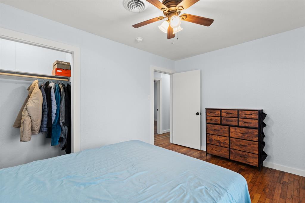 2506 South 24th Street Waco, TX 76706 - Photo 28 of 39 a bedroom with a bed and a closet
